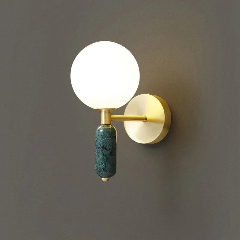 Carra Marble and Brass Globe Wall Sconce for Bedrooms
